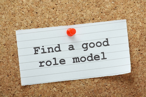 The phrase Find a Good Role Model on a notice board